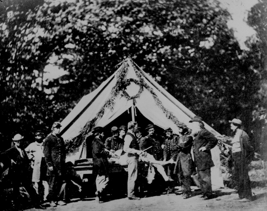 Though staged after the war, this image is one of the few existing photographs of a Civil War era amputation surgery. This "surgery" was staged outside of a Gettysburg hospital tent. 