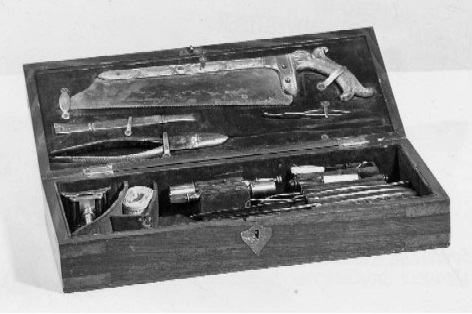 Dr. George Fordyce Newell’s medical kit (above) was typical of that used by a Civil War surgeon. At a minimum, these kits consisted of two surgical saws, cutting pliers, a curved probe, clamps, a retractor, a brush, and trepanning instruments. Surgeons would use the probes to inspect a wound before using the clamps, retractor, and saws for the amputation surgery itself. 