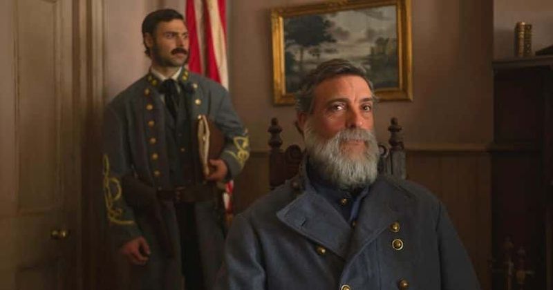 History.orgRobert E. Lee prepares to surrender his army in a scene from History Channel's "Grant"