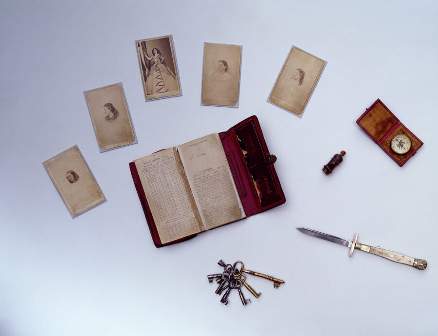 The contents of Booth's pockets at the time of his death, including a diary (center) and compass (upper right).