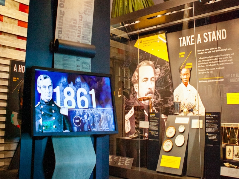 Pillars organize the gallery by year and include interactive screens that allow you to explore specifics about the artifacts in the room. 