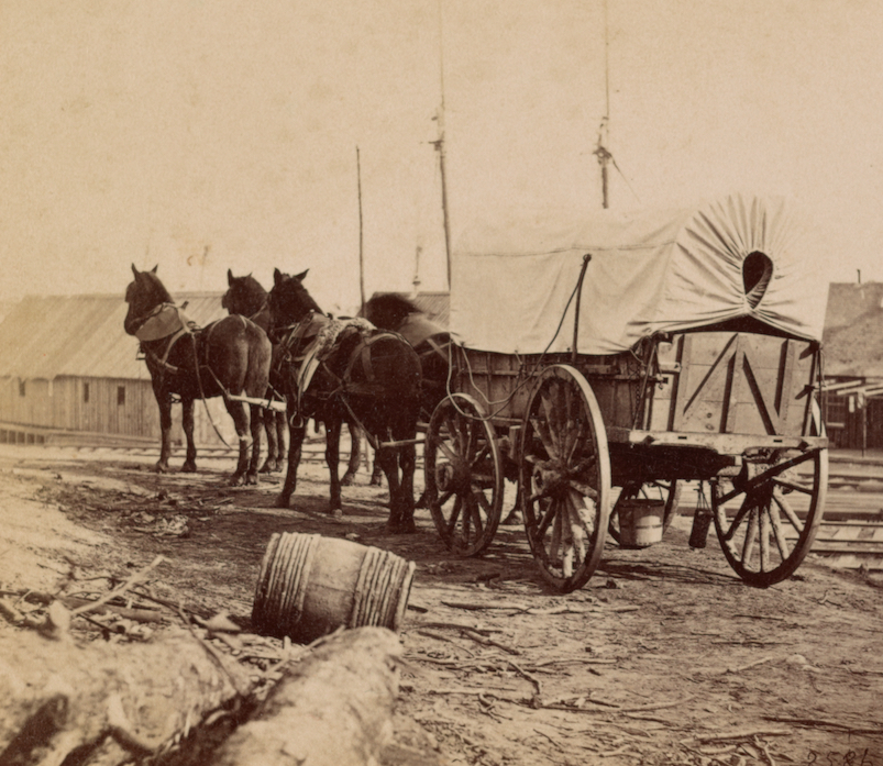An army wagon heads to the Union commissary depot at City Point, Virginia, in this photo published by E. & H.T. Anthony & Co.