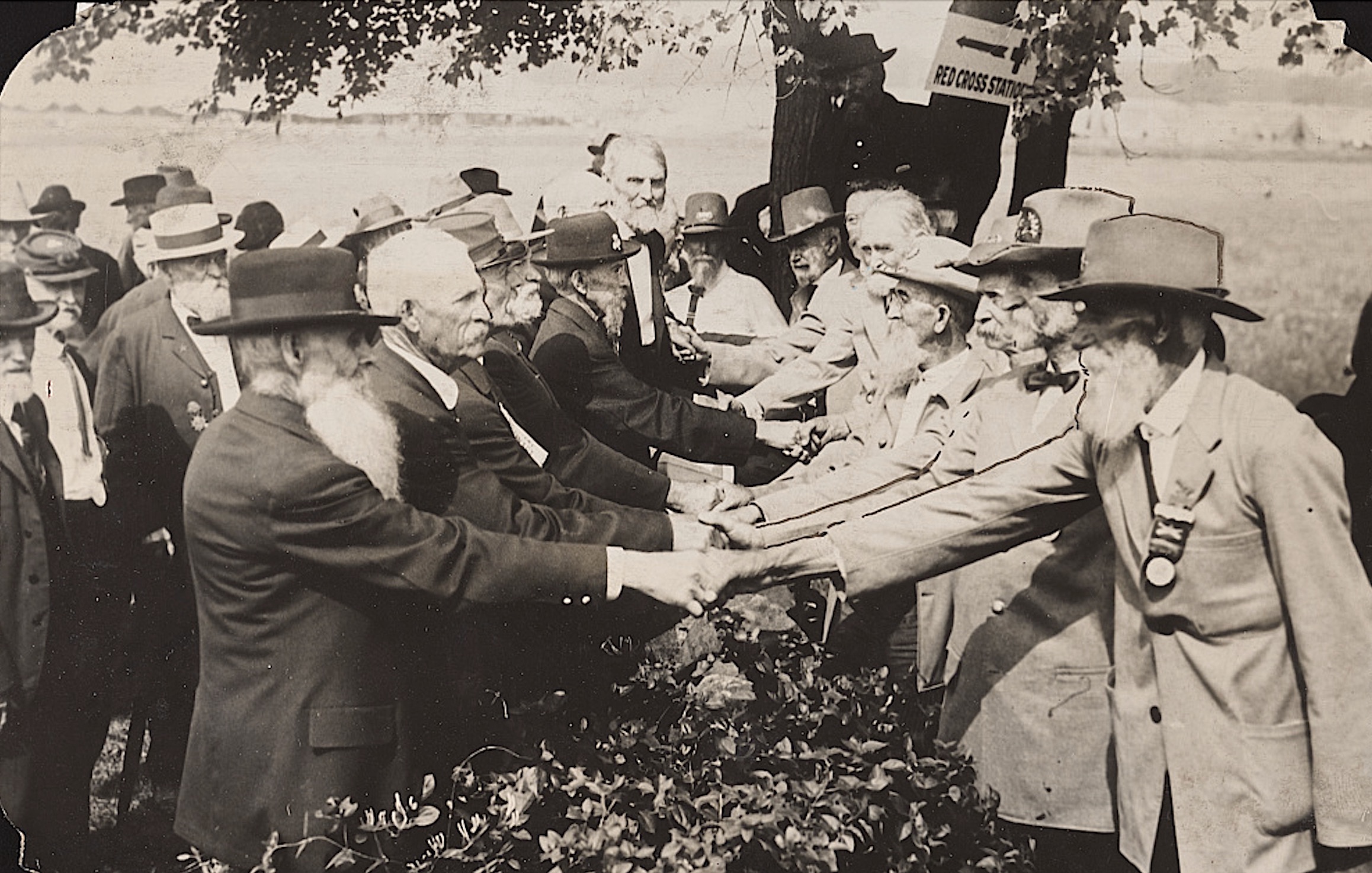 Union and Confederate veterans greet one another at the reunion to commemorate the 50th anniversary of the Battle of Gettysburg in 1913.