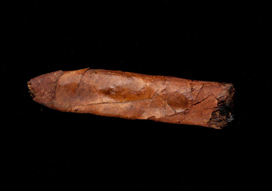 Partially smoked cigar.
