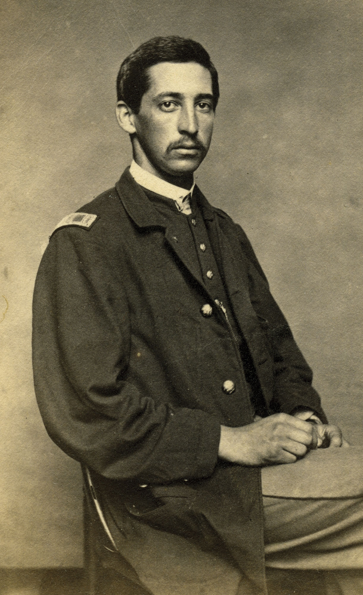 Portrait of Henry Newton Comey, Sergeant, 2nd Massachusetts Infantry, standing in uniform.