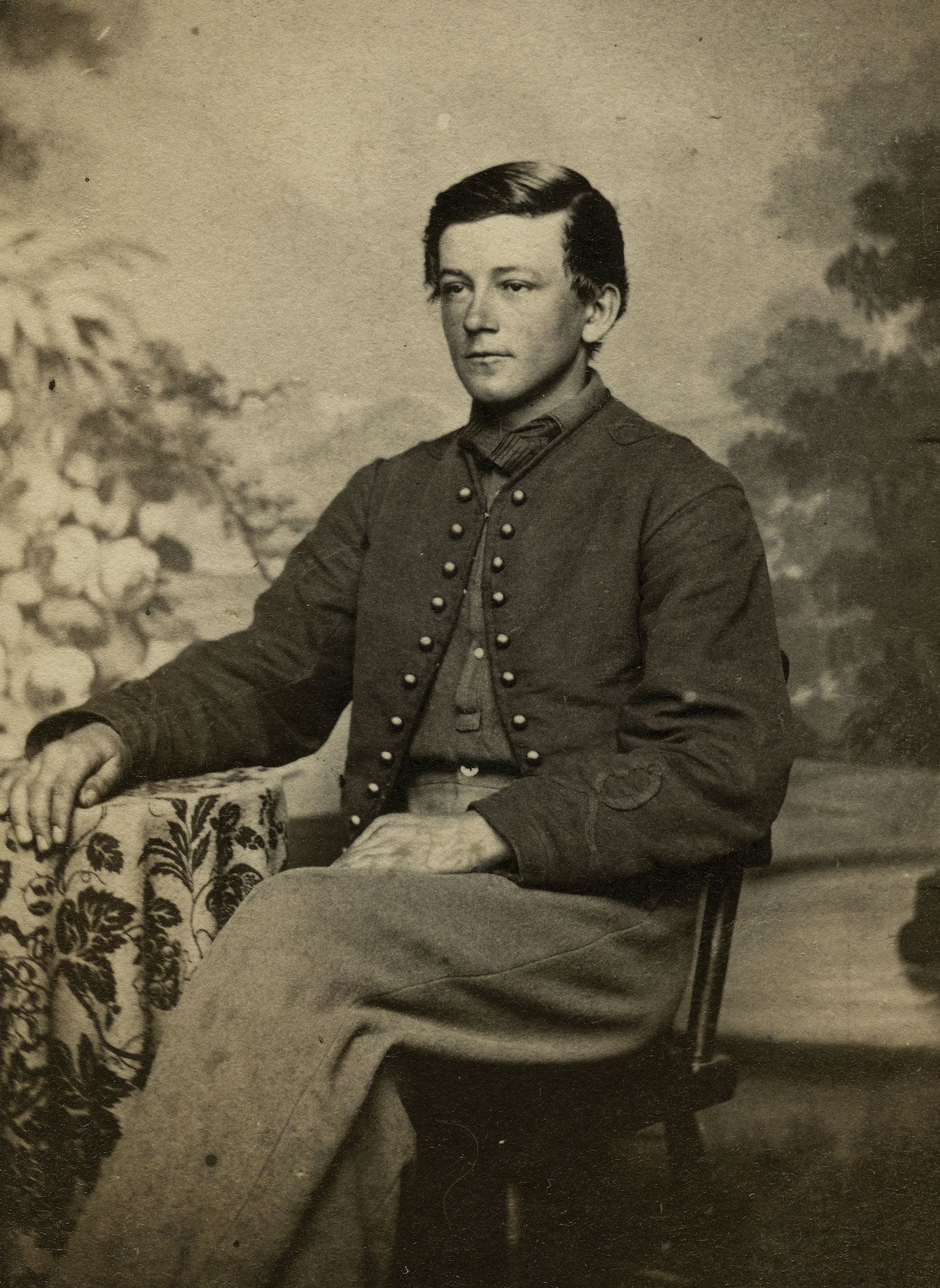 Large portrait of James H. Krake, Corporal, 44th New York Infantry, young soldier seated in uniform.