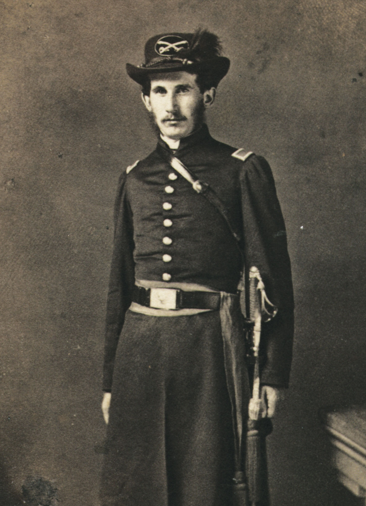 Portrait of John G. Pierce, Captain, 10th New York Cavalry, standing in uniform.