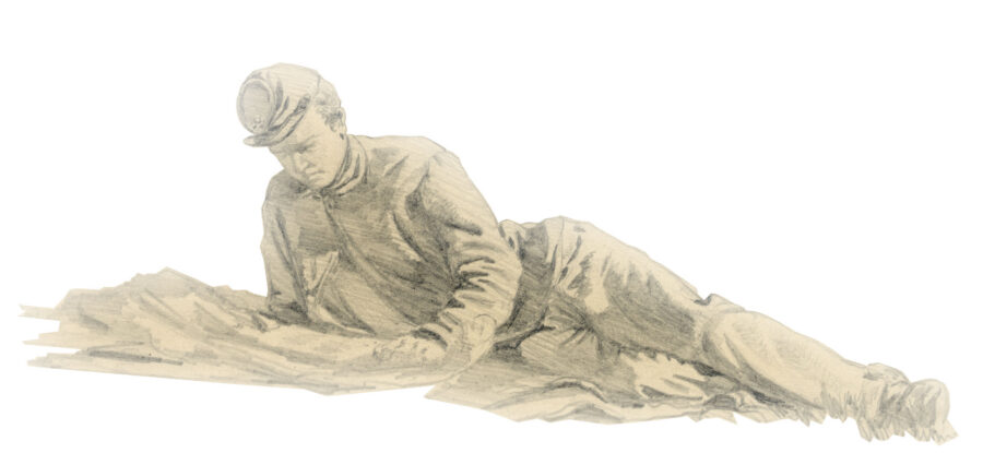Civil War soldier lounging on ground reading a newspaper.