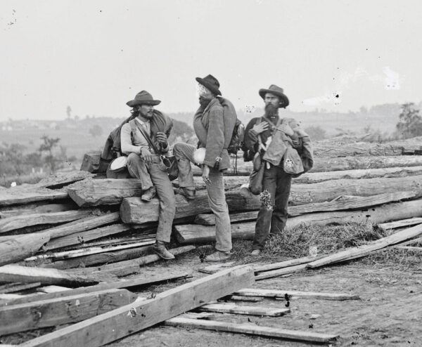Confederate prisoners pose shortly after the Battle of Gettysburg on Seminary Ridge.